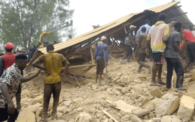 Photo of a two-storey building collapse